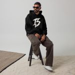 unisex-relax-hoodie-black-back-6a25c7e8a38d4.jpg